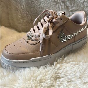 Women's Beige Nike Sneakers with Silver Accents